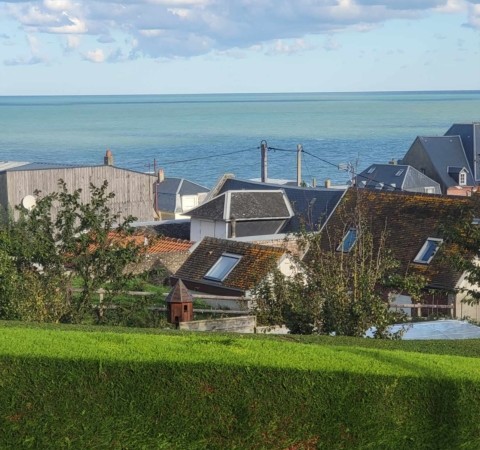 Belle maison en briques vue sur mer